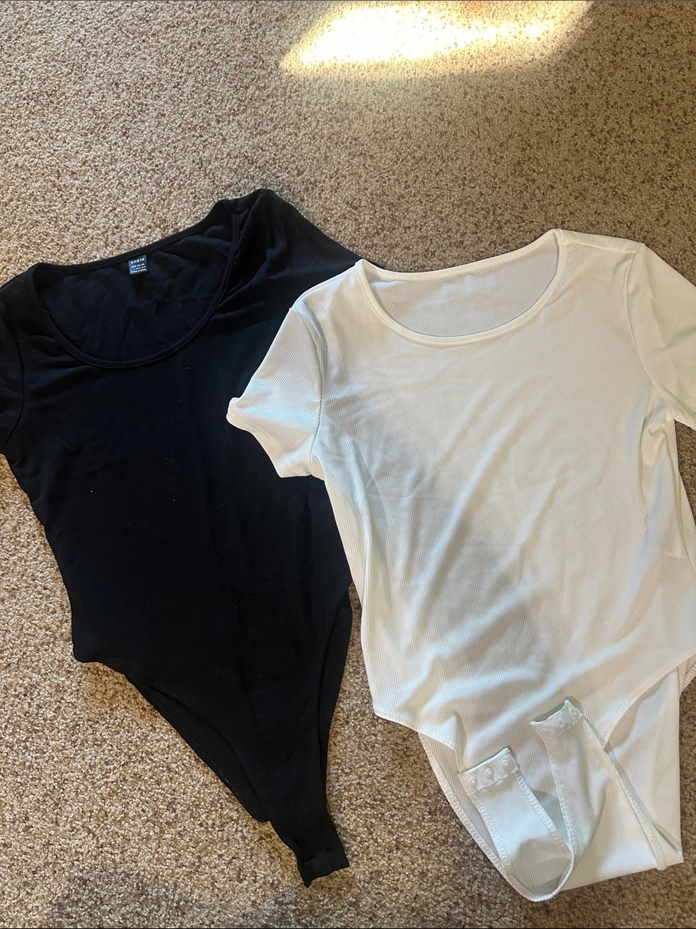 White and Black Bodysuits with buttons - duo